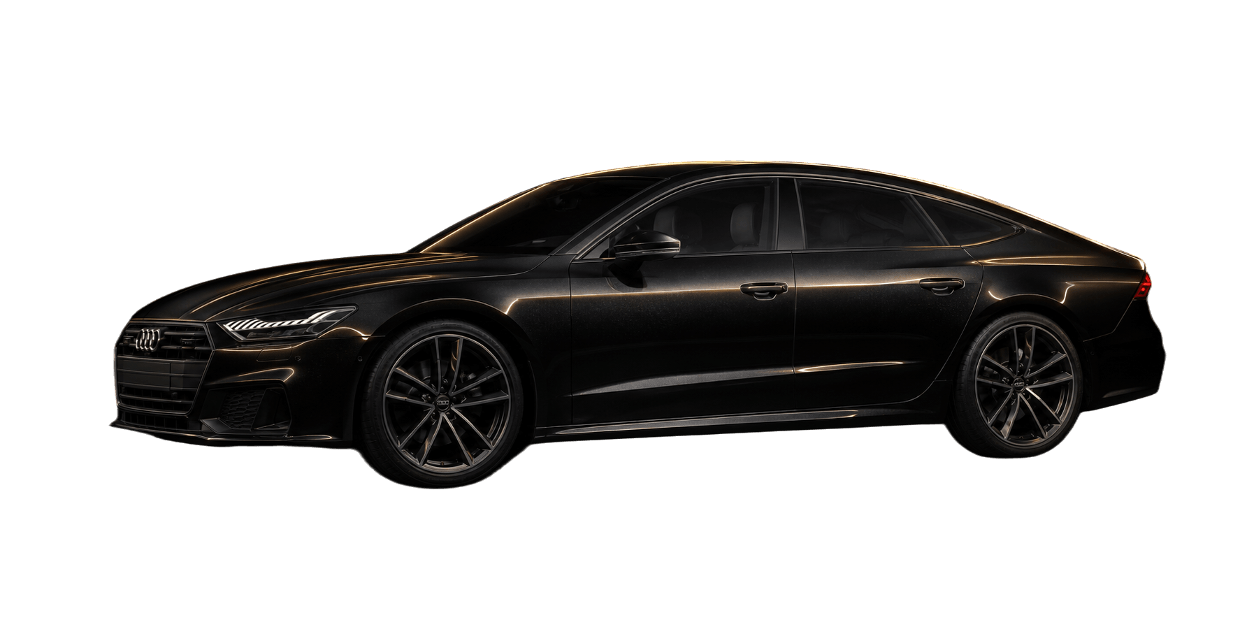 Black Audi A7 sportback under a single warm gold rim light in a dark studio.